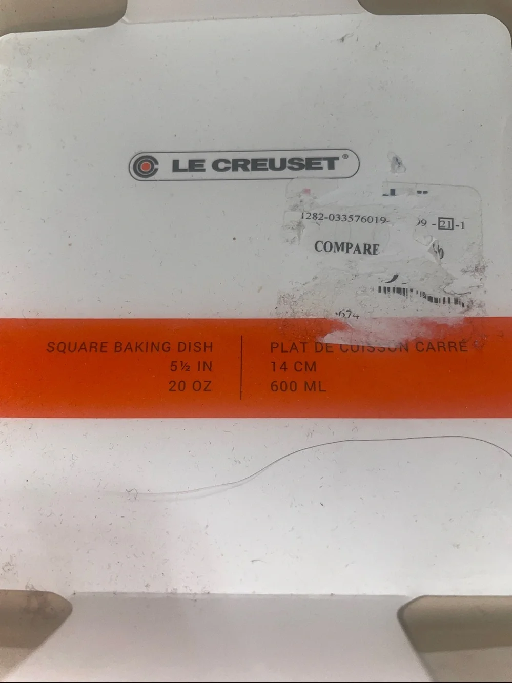 Brand New Le Creuset 5 1/2” square red baking dish that holds 20oz